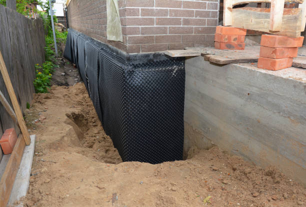 SJ Waterproofing Pros technician performing targeted Waterproofing assessment in Maysville, KY